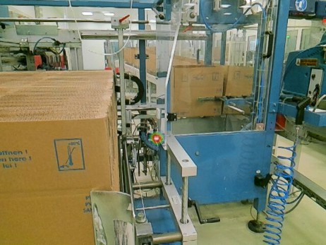 Ultraschallkamera lokalisiert Leckage an Verpackungsmaschine über offenen Spalt statt durch Plexiglas